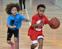 Kid's Playing Basketball